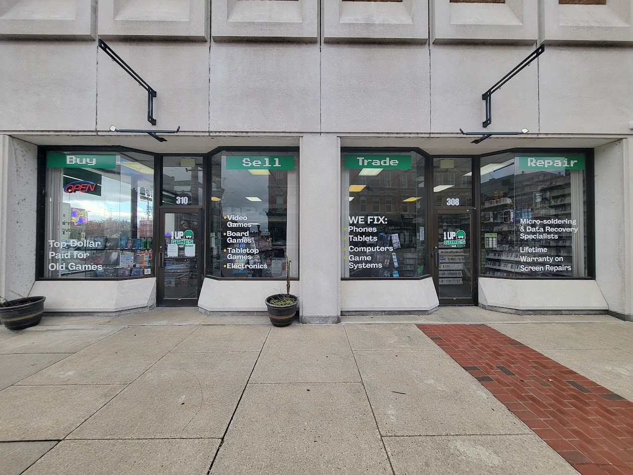 1UP Games & Repairs Bay City storefront